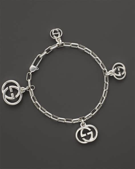 gucci silver interlocking charm bracelet.